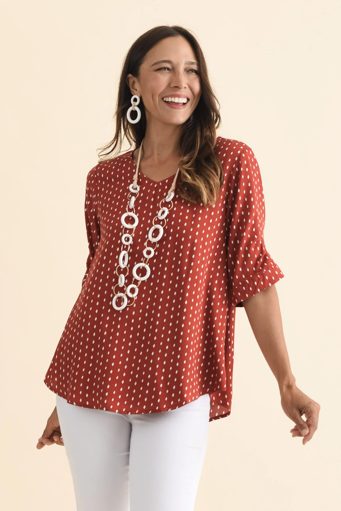 Riveria Rust Dash V Neck Top